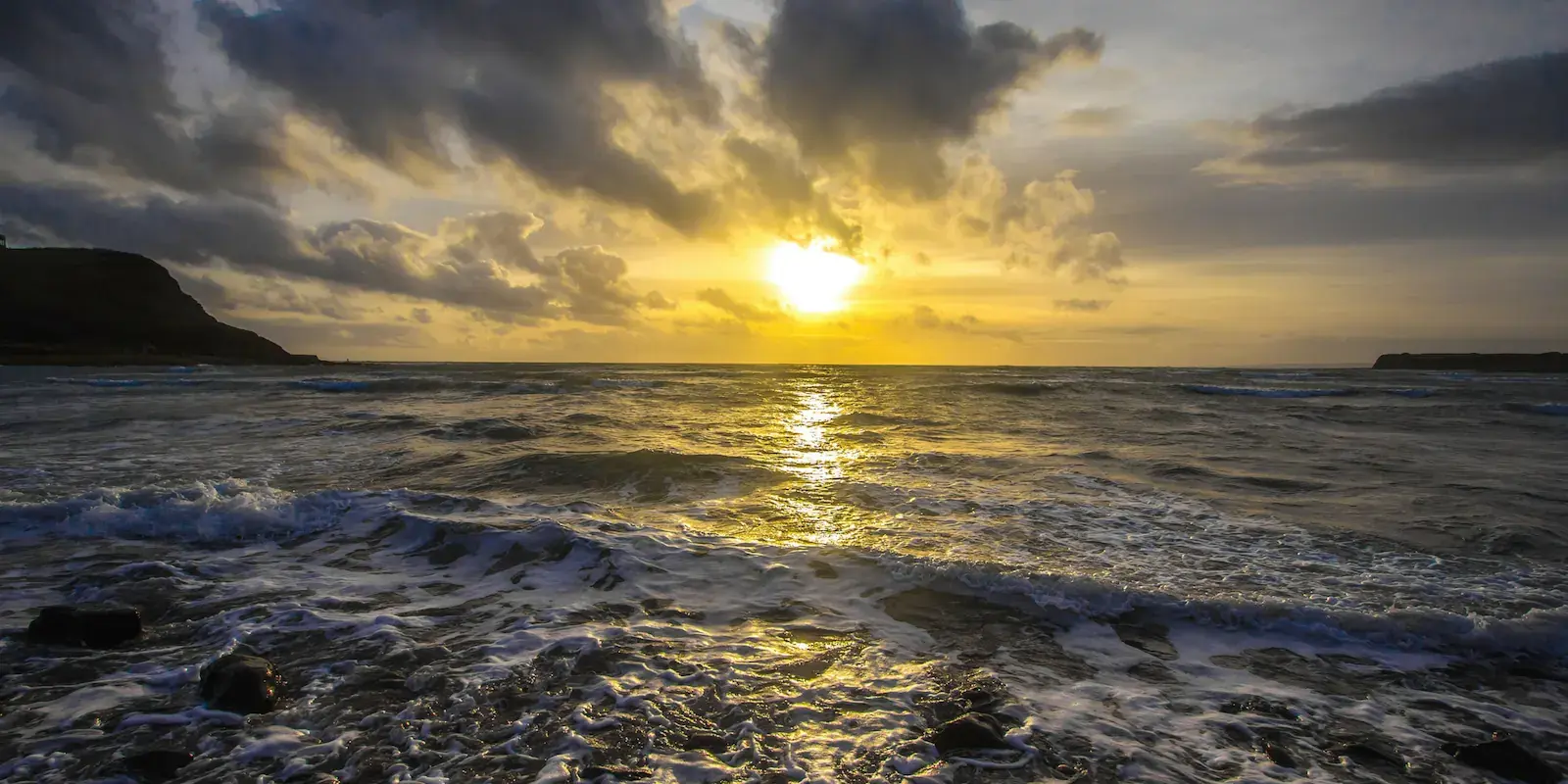 Sunset over a stormy Alaska shoreline